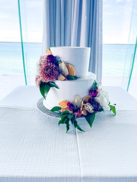 2 Tier Smooth Buttercream with Bright Flowers