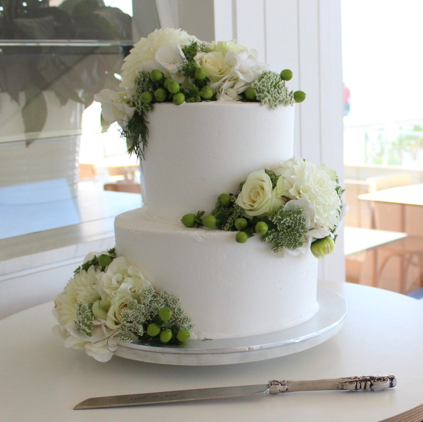 2 Tier Buttercream with White & Green Flowers