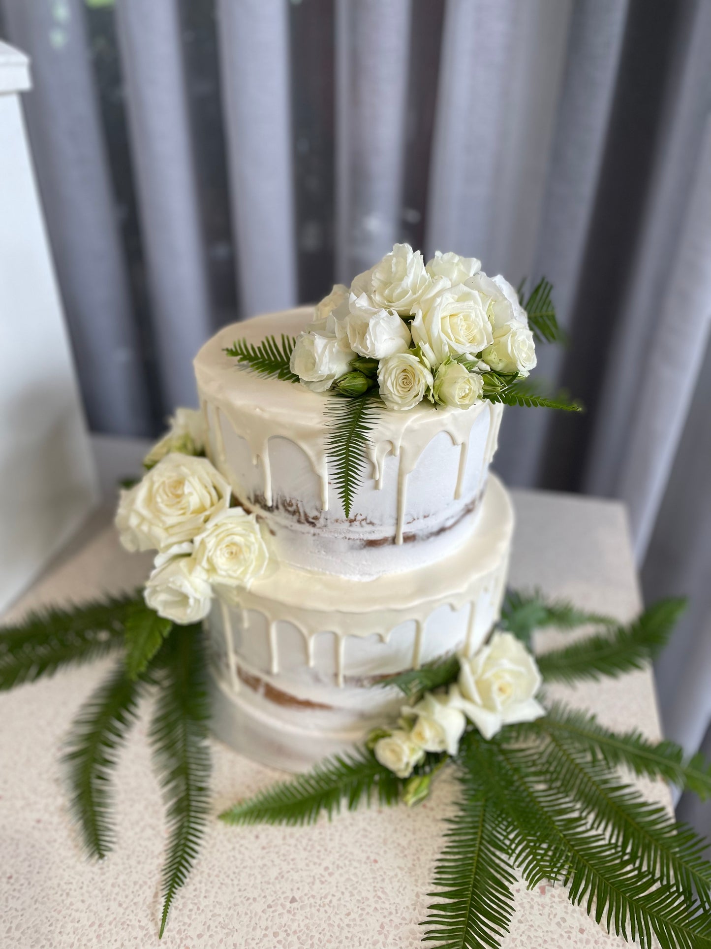 2 Tier Semi Naked with White Drizzle & White Flowers