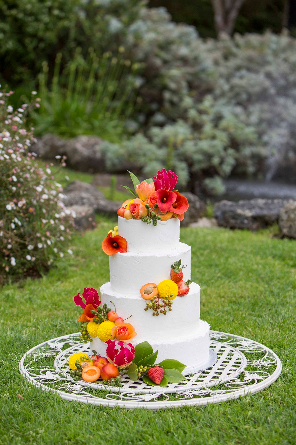 Hanging 4 Tier Cake With Fruits and Bright Colour Flowers