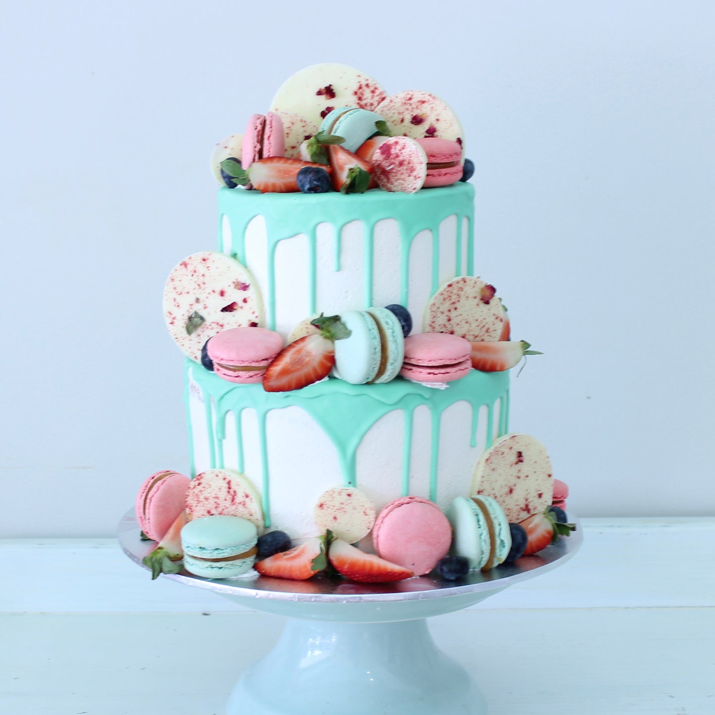 2 Tier Aqua Drizzle Cake with Macaron's, Chocolates & Berries