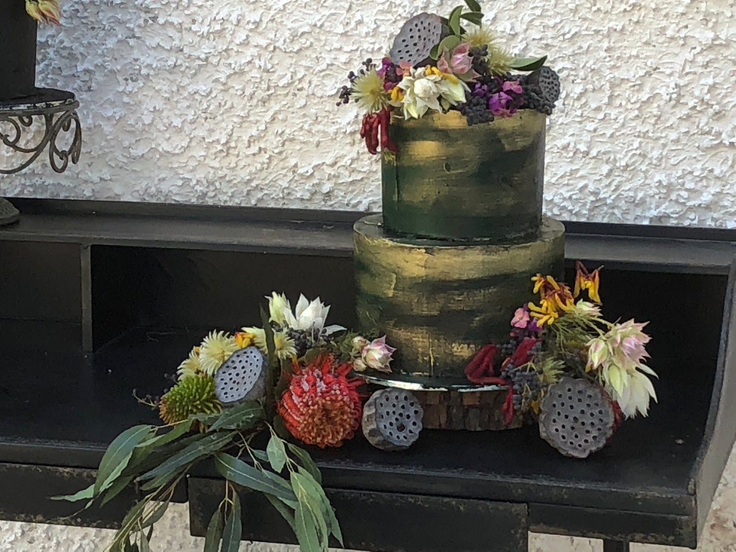 2 Tier Dark Green & Gold Cake with Natives