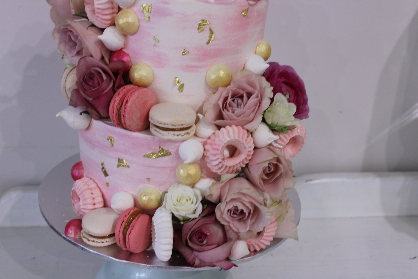 2 Tier Pink Buttercream, With Tones of Pink Decorations
