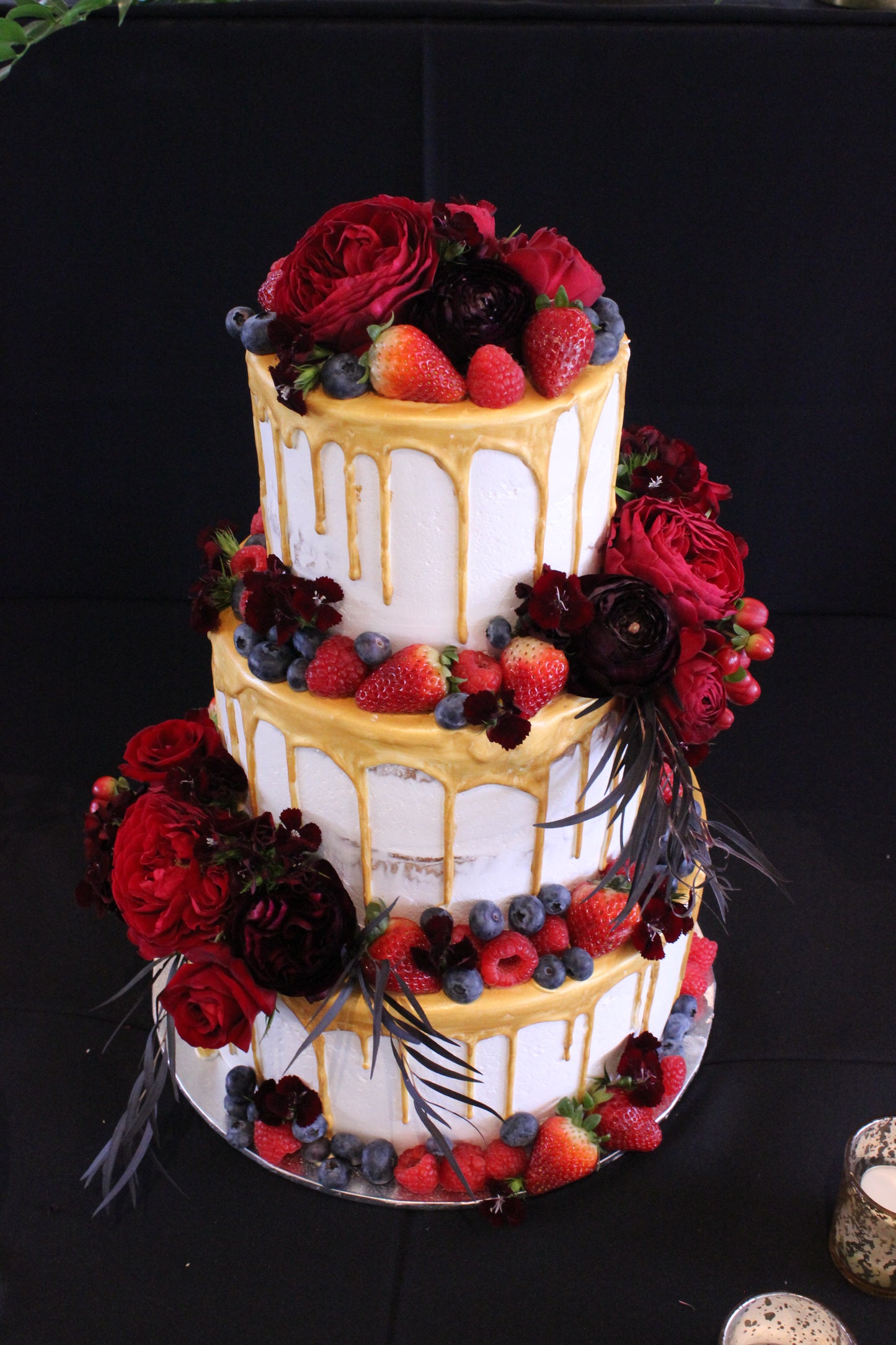 3 tier Gold Drizzle Cake with Red Flowers & Berries