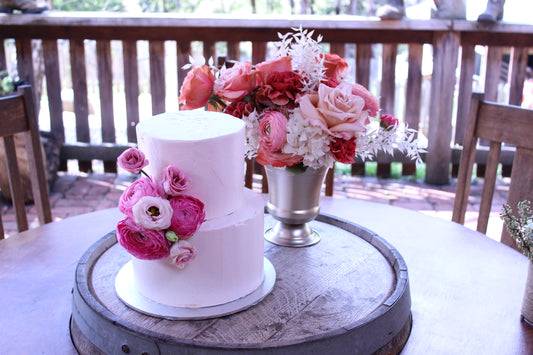 2 tier Pink Buttercream with Pink Flowers