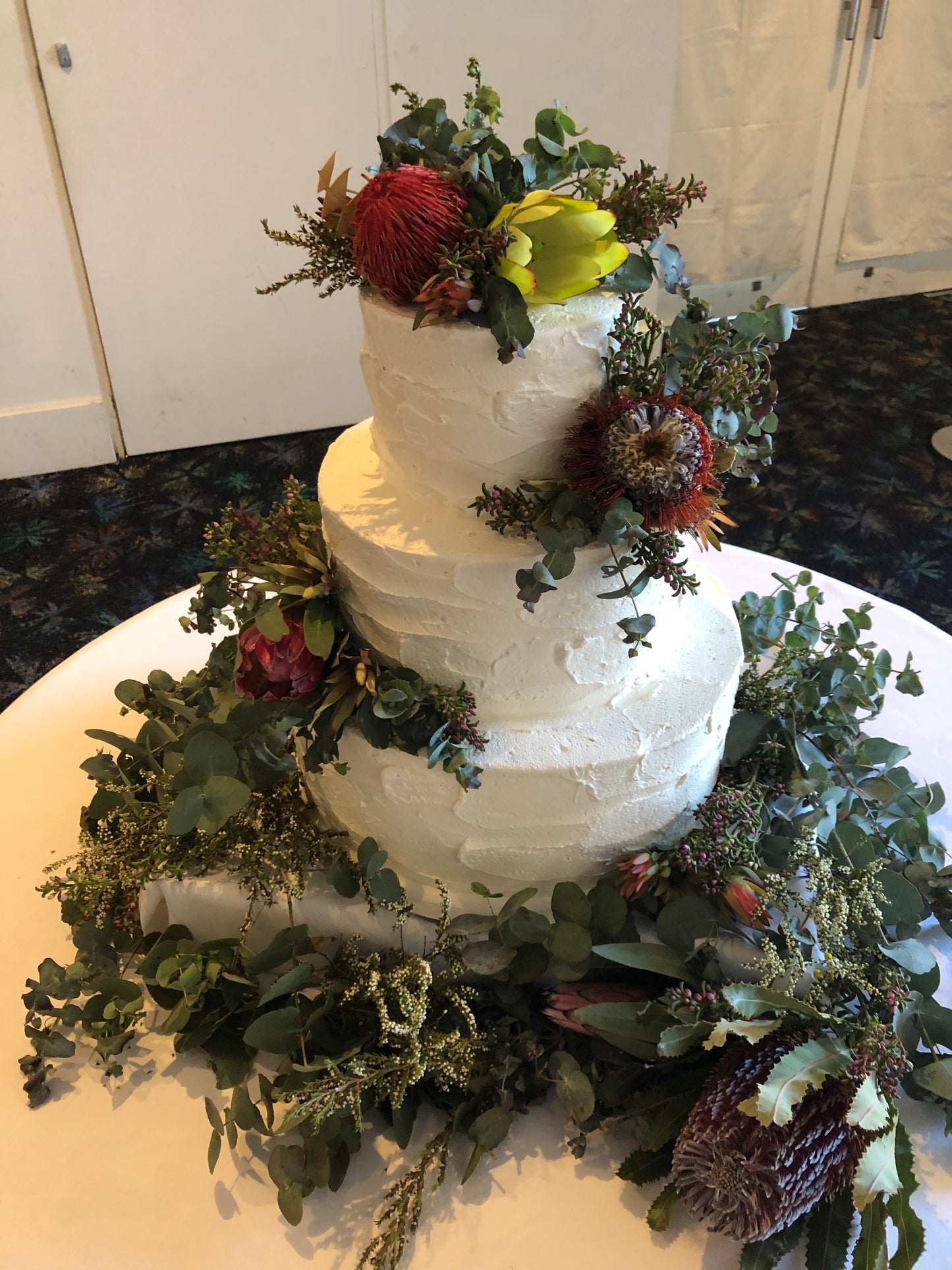 3 Tier Rough Buttercream with Native Flowers