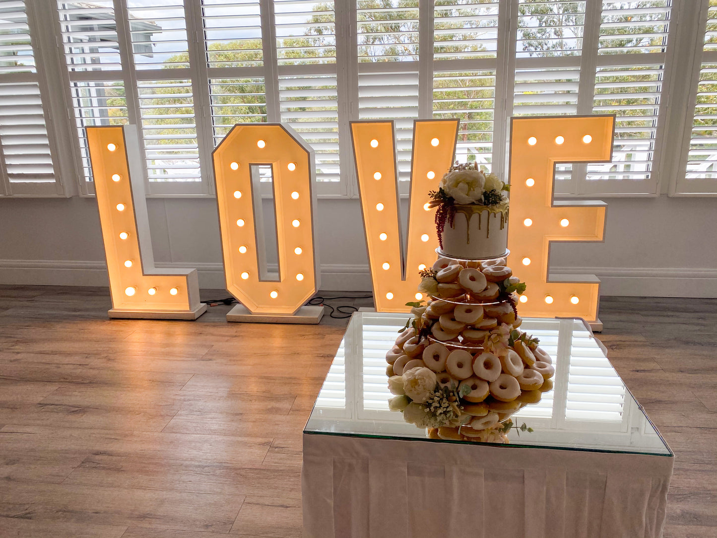 Donut Tower With Cutting Cake