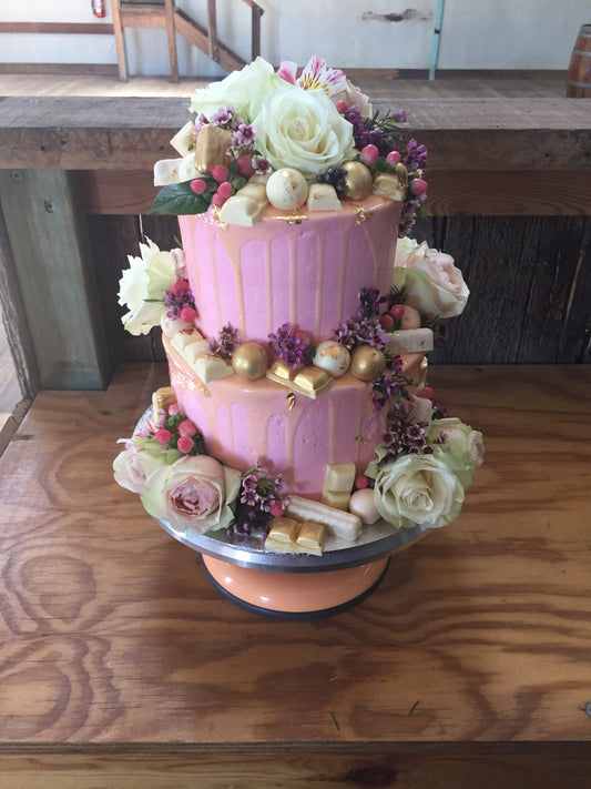 Pink Buttercream Cake with Flowers & Gold Chocolates