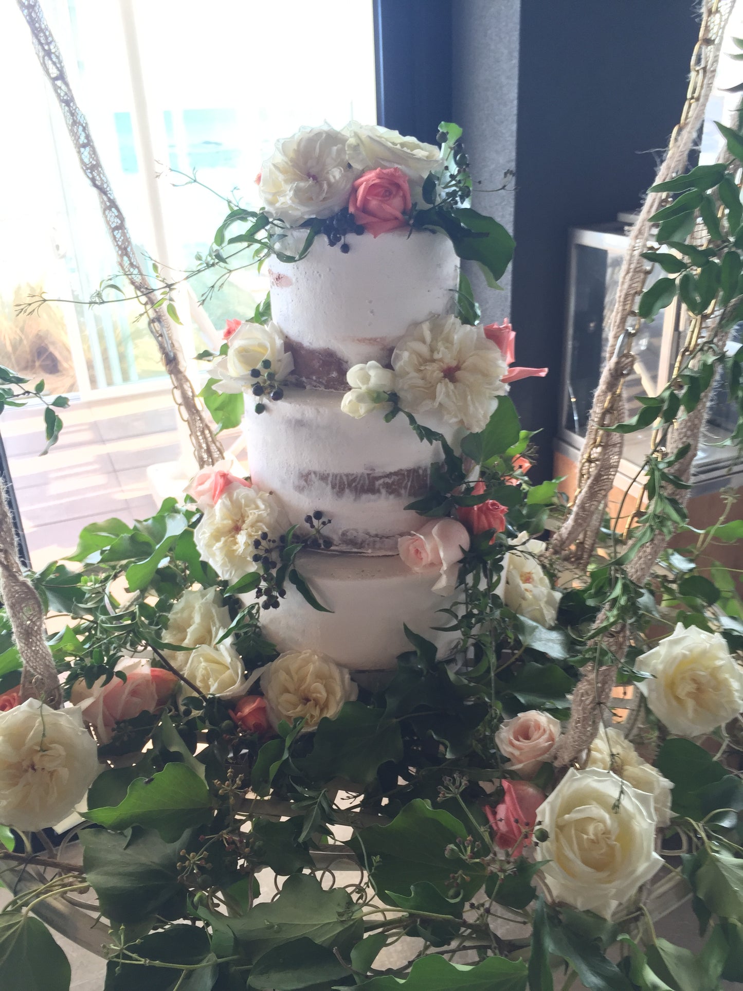 Hanging 3 Tier Semi Naked Cake With Pastel Flowers