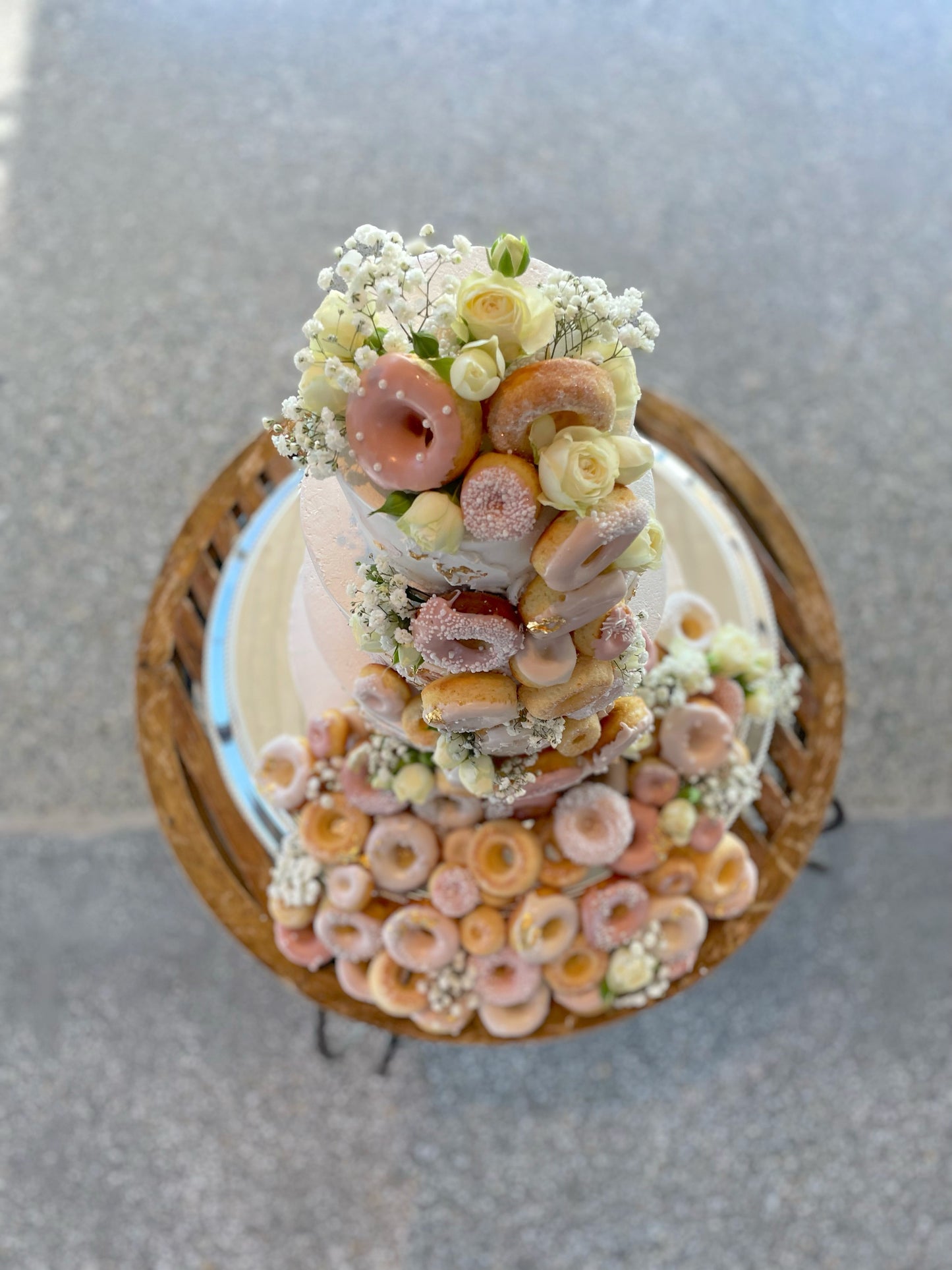 3 tier Pink & Ivory Buttercream With Cascading Donuts