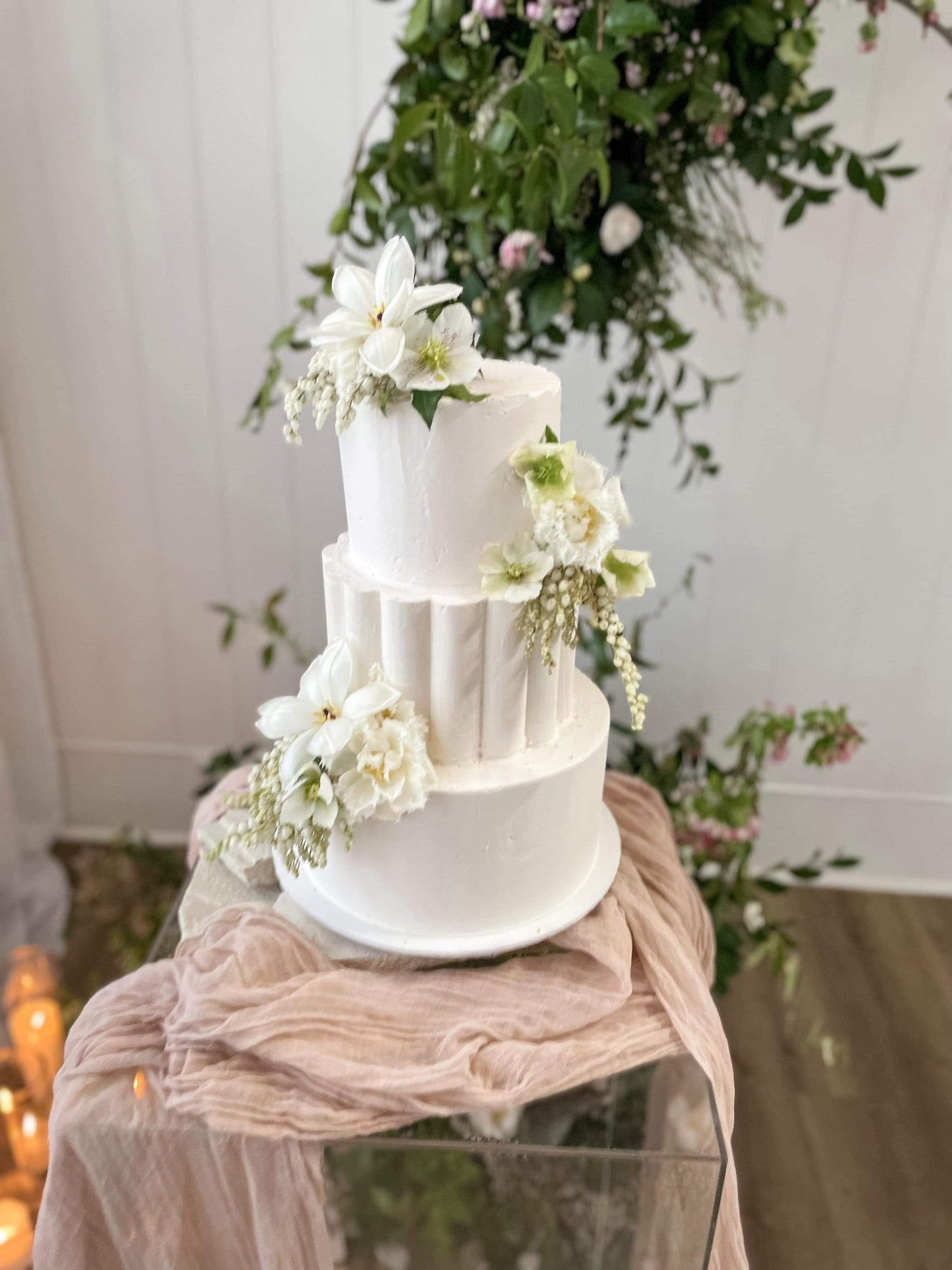 3 Tier Scollop Buttercream cake with spring flowers