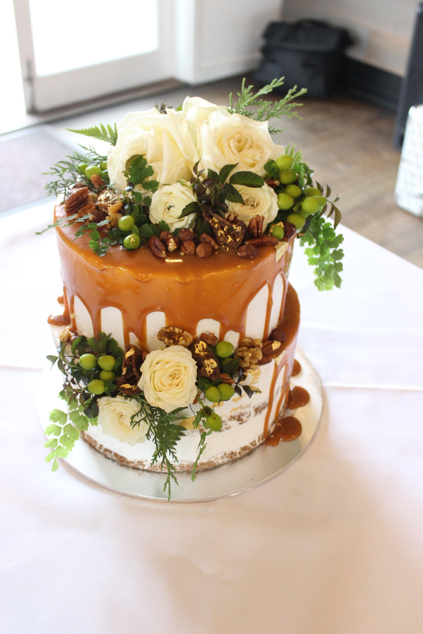 2 Tier Semi Naked with Caramel, White Roses and Nuts