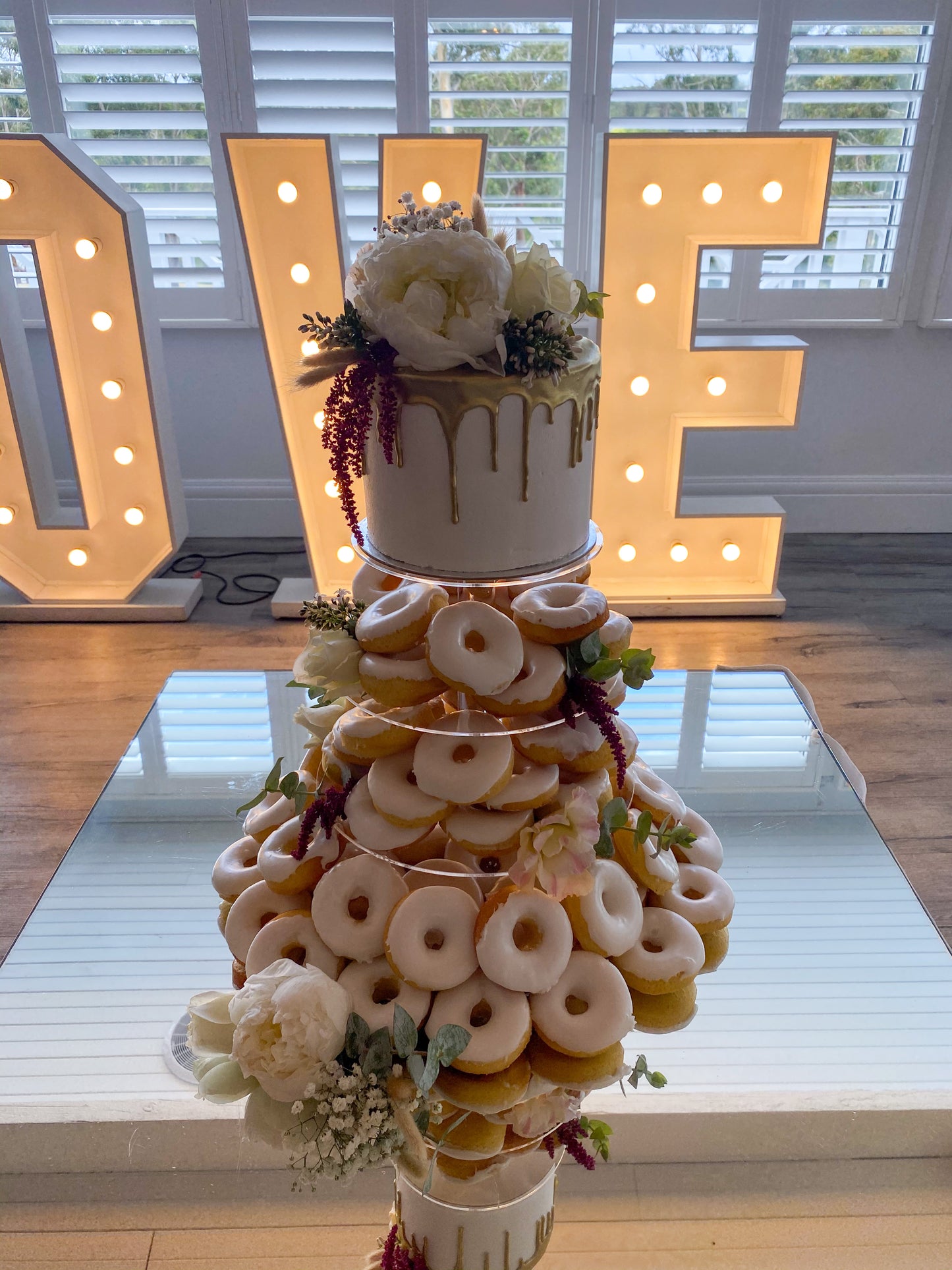 Donut Tower With Cutting Cake