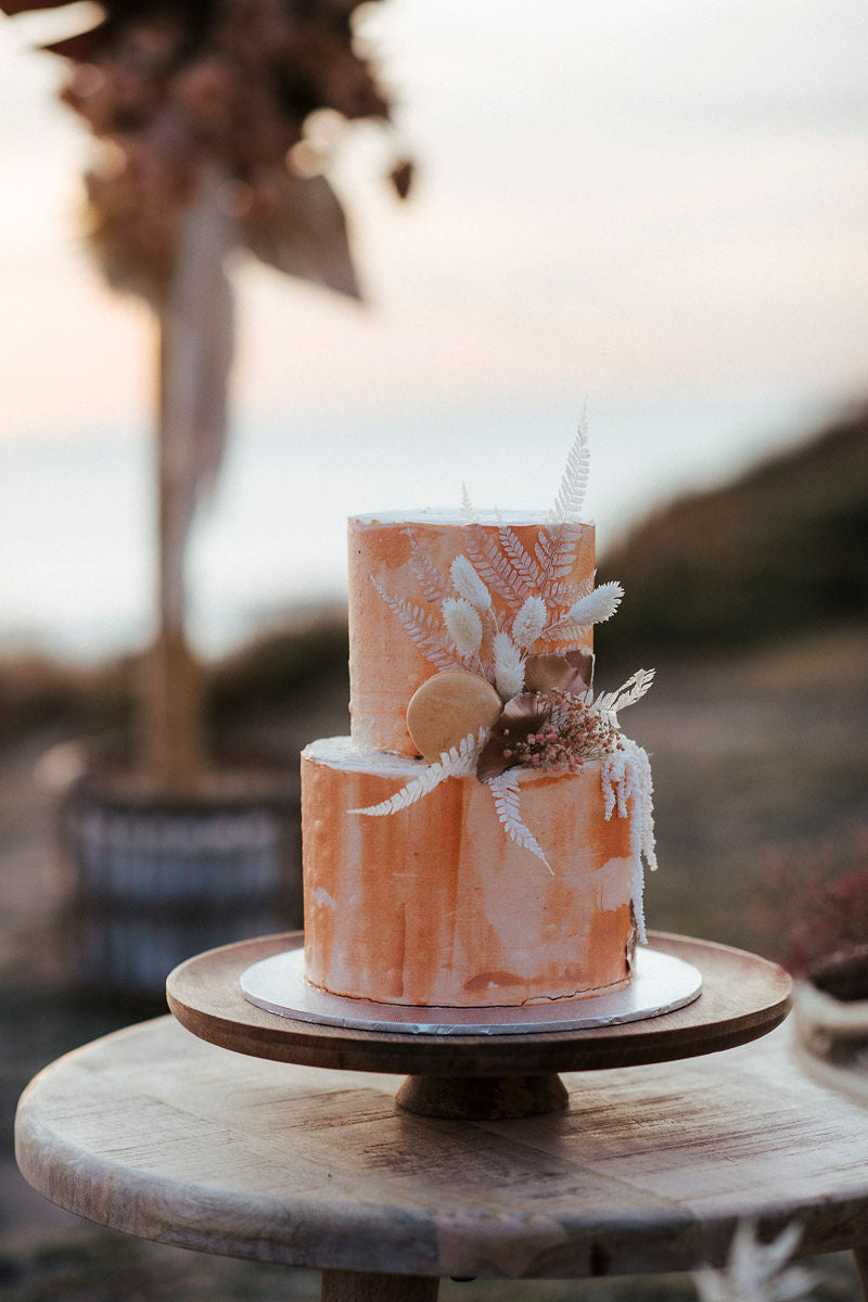2 tier Terracotta Marble Buttercream With Dried Flowers