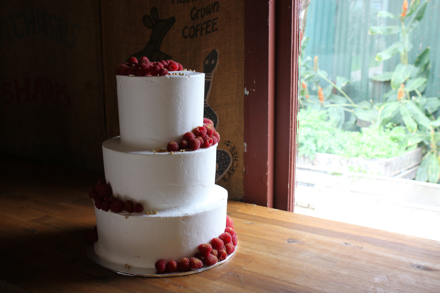 3 Tier Smooth Buttercream with Raspberries & a Touch of Gold
