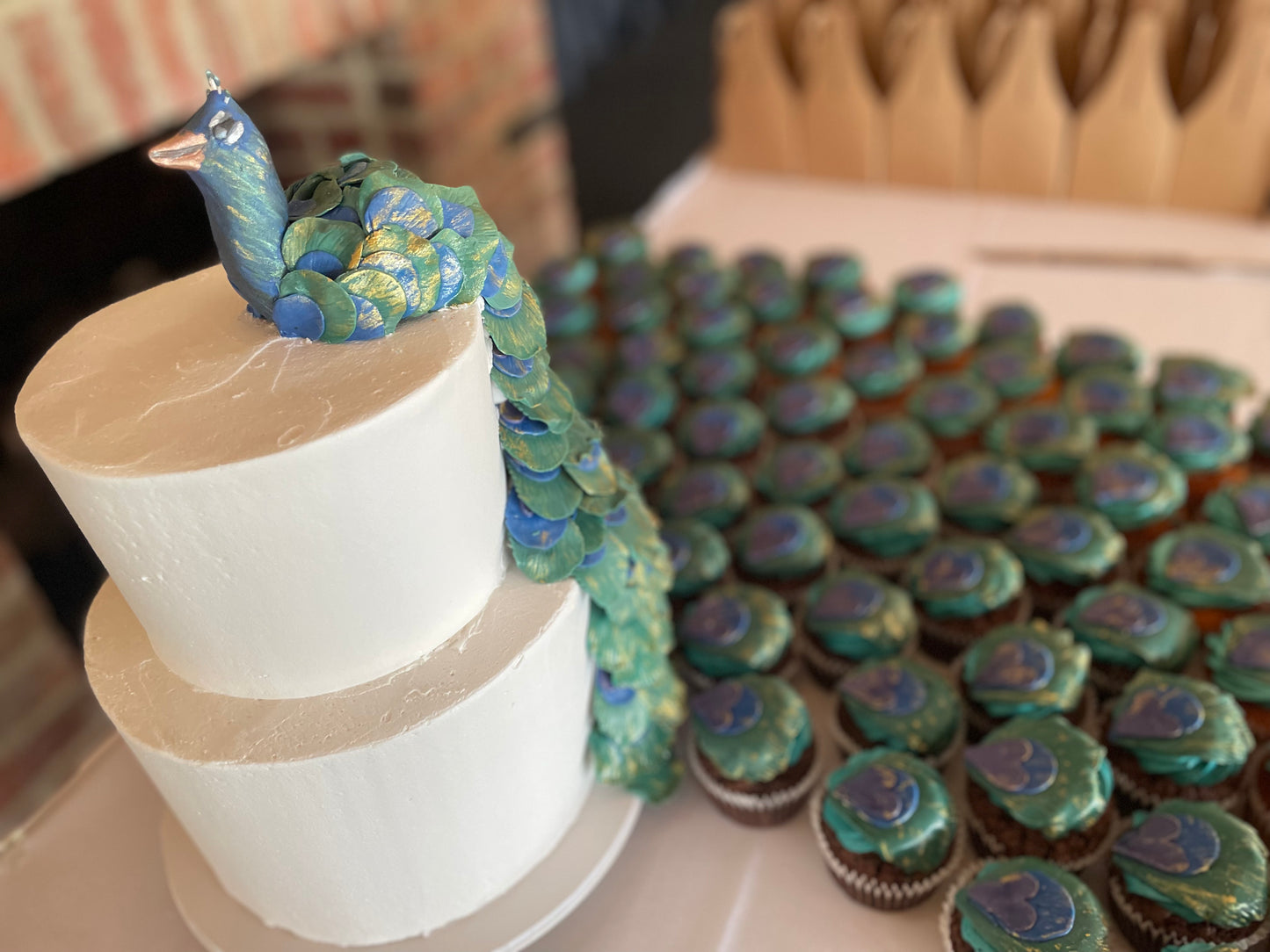2 Tier Peacock Cake with CupCakes