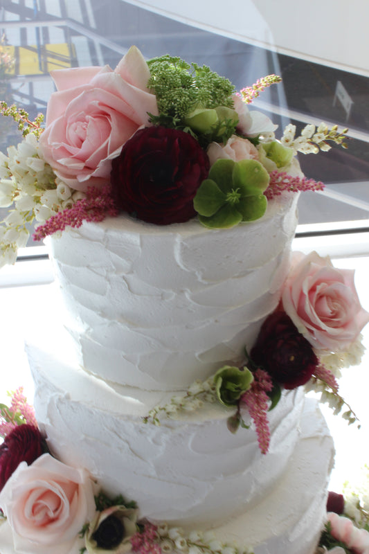 3 Tier Rough Buttercream With Pink Flowers