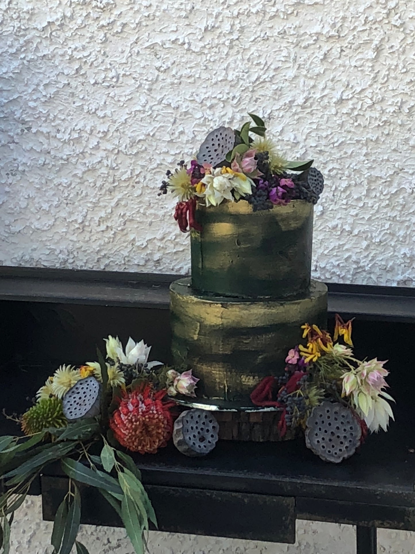 2 Tier Dark Green & Gold Cake with Natives