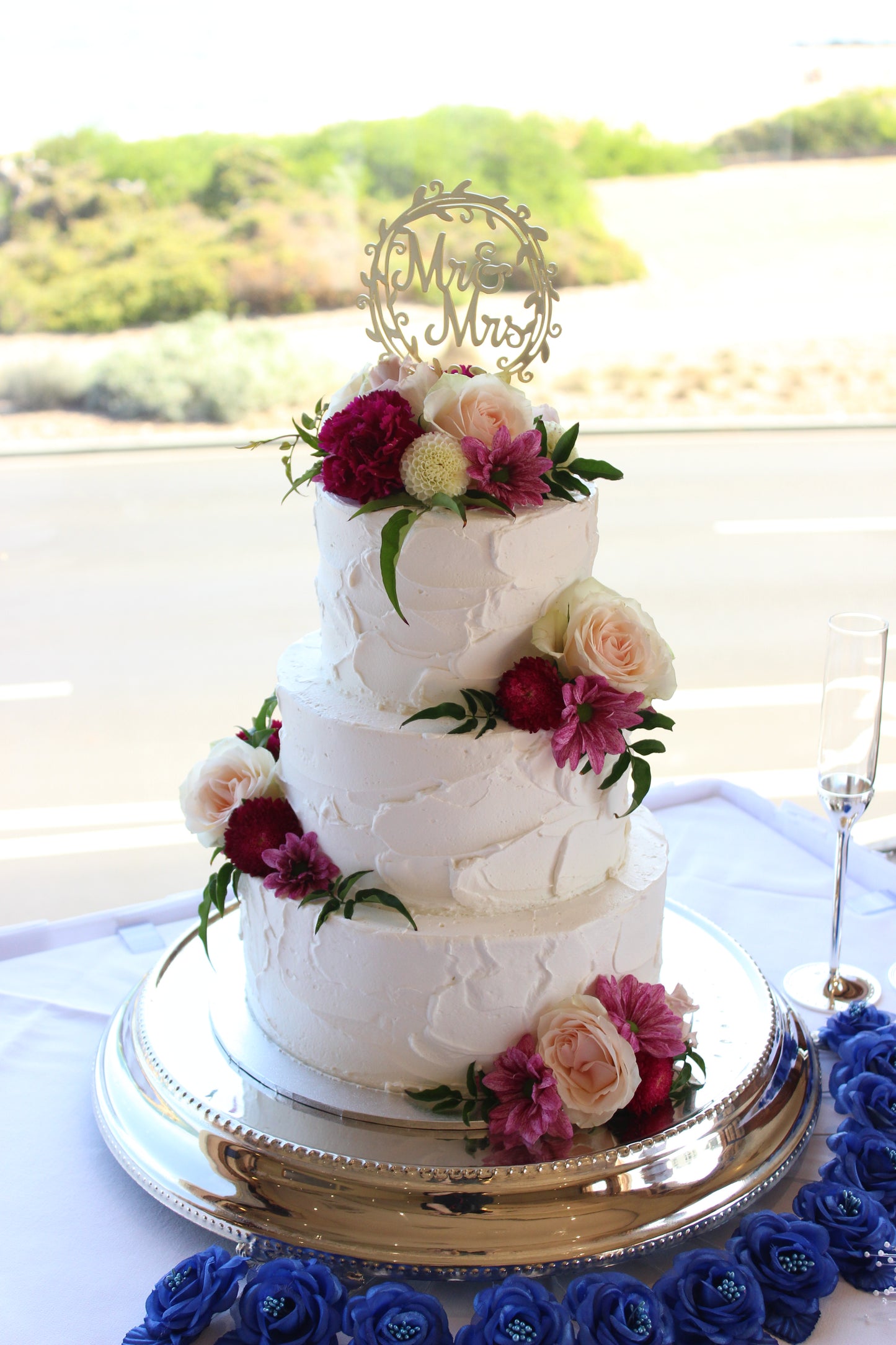 3 Tier Rough Buttercream with Bright Flowers