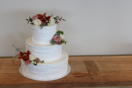 3 Tier Rough Buttercream with Pink and White Flowers