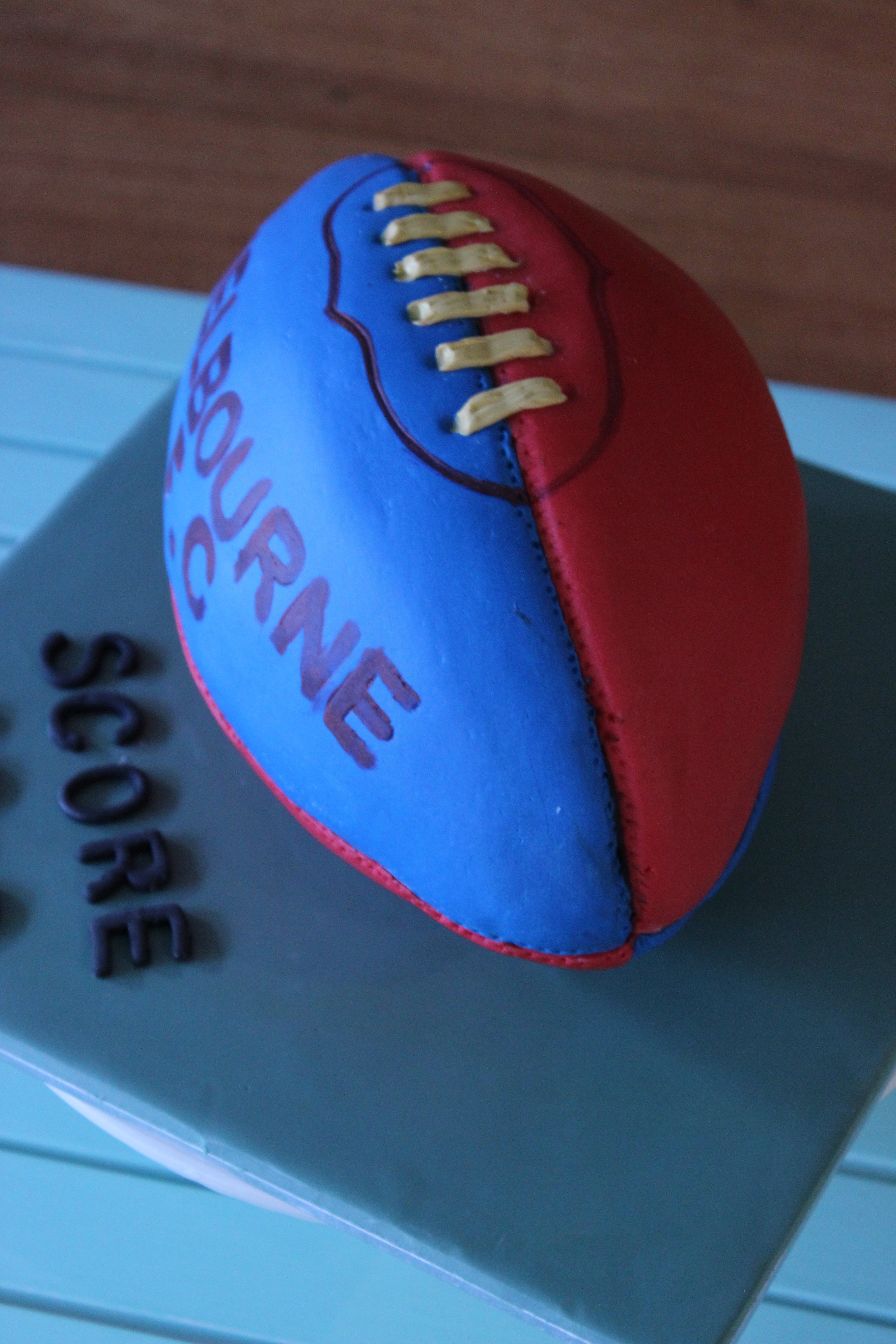 AFL Birthday Cake with edible name plaque and club logo